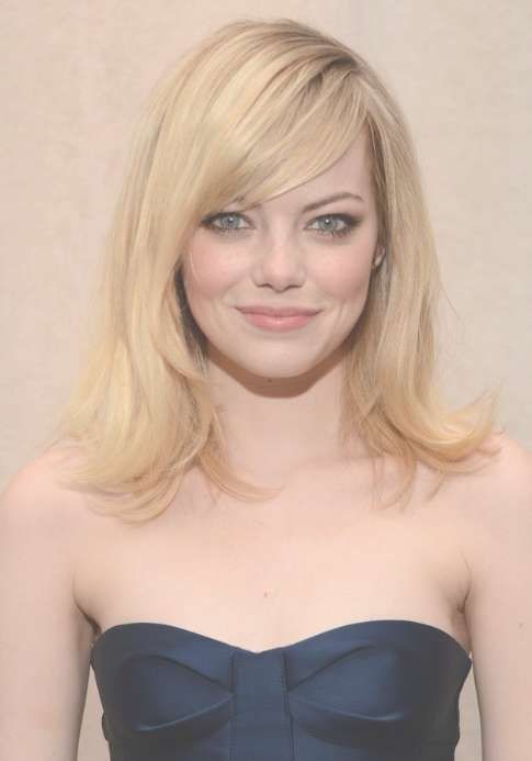 Emma Stone Layered Medium Length Hairstyle With Side Swept Bangs With Recent Side Swept Medium Hairstyles (View 3 of 15)