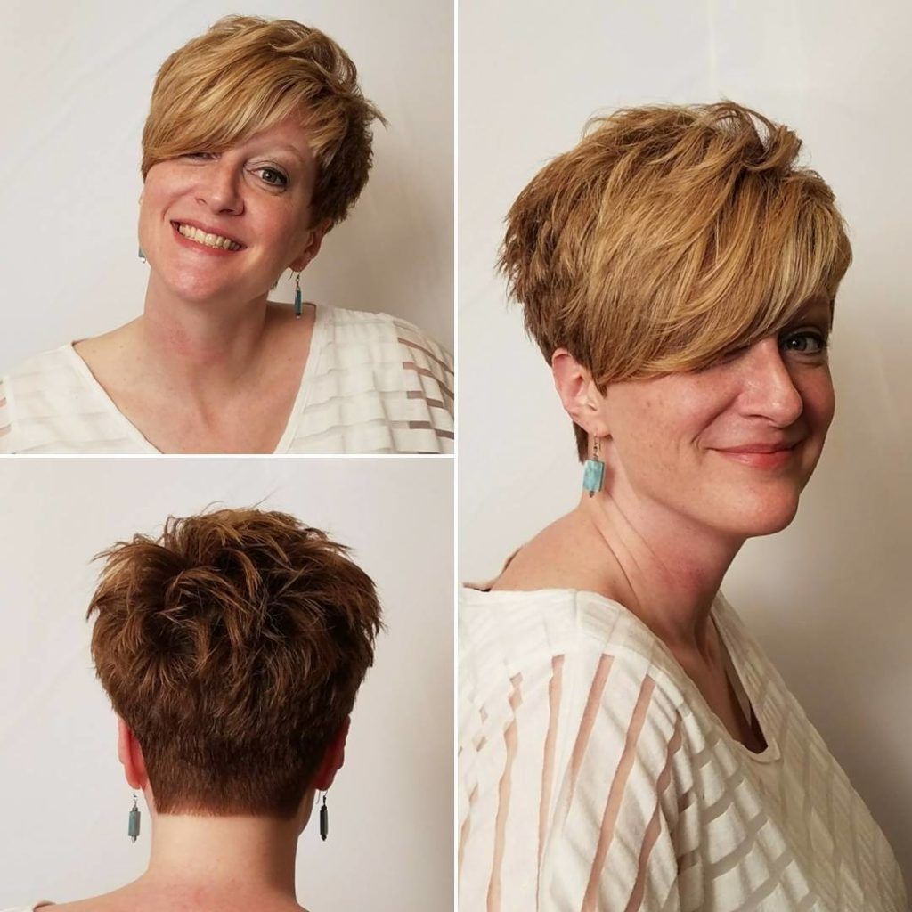 Women's Textured Tousled Pixie Cut With Long Asymmetrical Side Inside Most Recent Tousled Pixie Hairstyles (View 4 of 15)