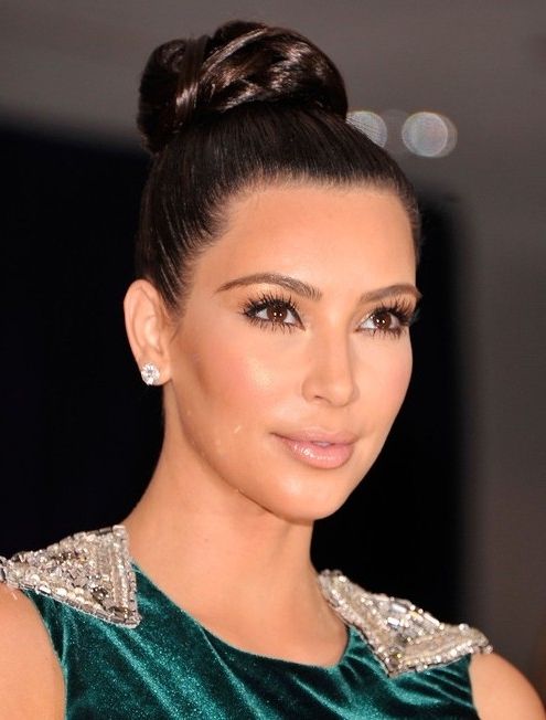 Kim Kardashian Long Hairstyles: Tight Bun Updos – Popular Haircuts With Regard To Recent Updos Buns Hairstyles (View 12 of 15)