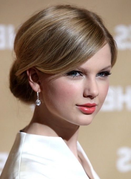 Taylor Swift Hairstyles: Elegant Bun Updos – Popular Haircuts Within Most Popular Updos Buns Hairstyles (Photo 7 of 15)