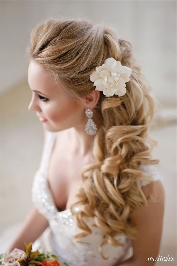 Half Up Half Down Wavy Bridal Hairstyle With White Flower Picture With Regard To Roses Wedding Hairstyles (Photo 9 of 15)