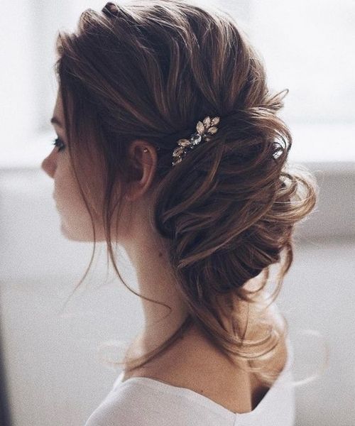 New Stylish Loose Low Bun Wedding Hairstyles 2017 – 2018 | Weekly Styles Throughout Low Bun Wedding Hairstyles (View 10 of 15)