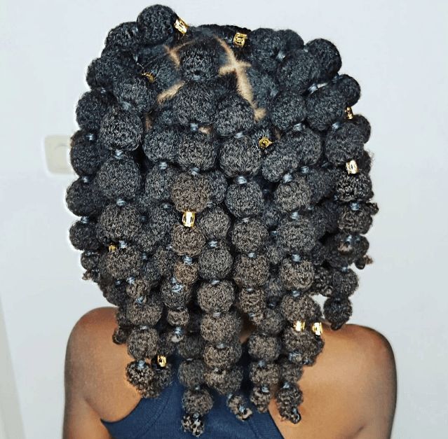Pics] Trending: Naturals Are Trying This Adorable Take On Banding Regarding Best And Newest Crossed Twists And Afro Puff Pony (View 15 of 15)