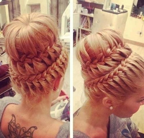Rather Regal Tiered Braids And Big Ol' Waterfall Bun. Stunning (View 13 of 15)