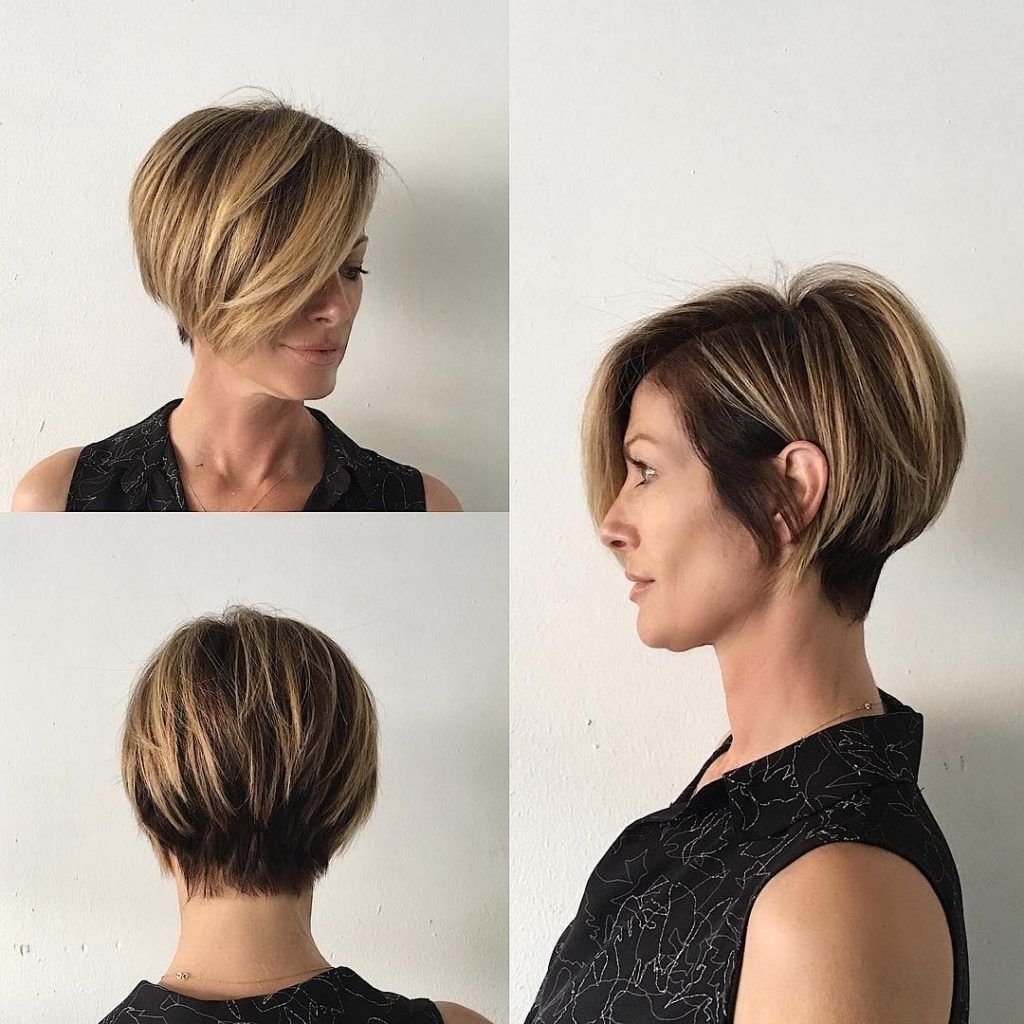 Women's Short Blonde Highlighted Bob With Stacked Layers And Long Inside Most Current Stacked Pixie Bob Haircuts With Long Bangs (View 15 of 15)