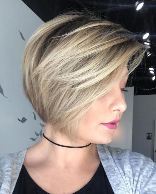 Featured Photo of  Best 25+ of Short Ash Blonde Bob Hairstyles with Feathered Bangs