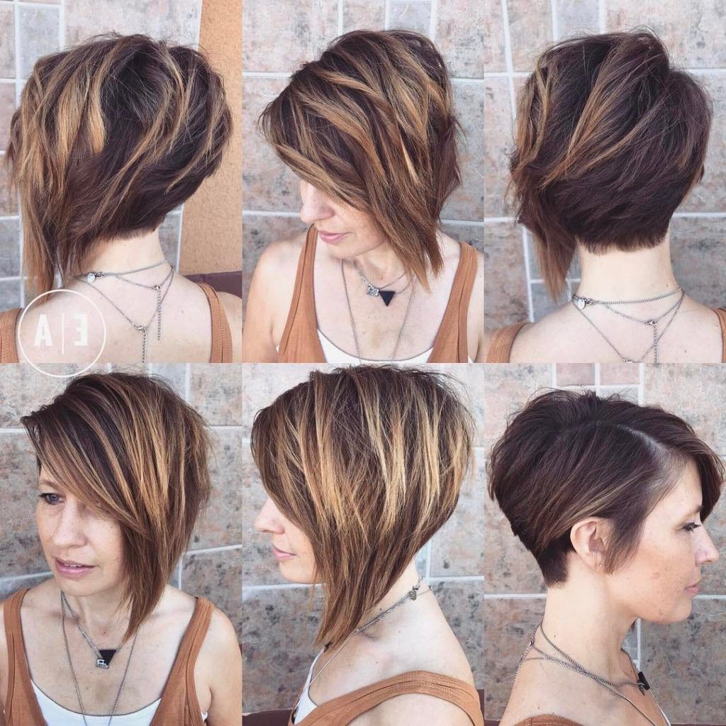 Women's Dramatic Asymmetric Textured Bob With Side Swept Bangs And Pertaining To Dramatic Short Hairstyles (View 23 of 25)