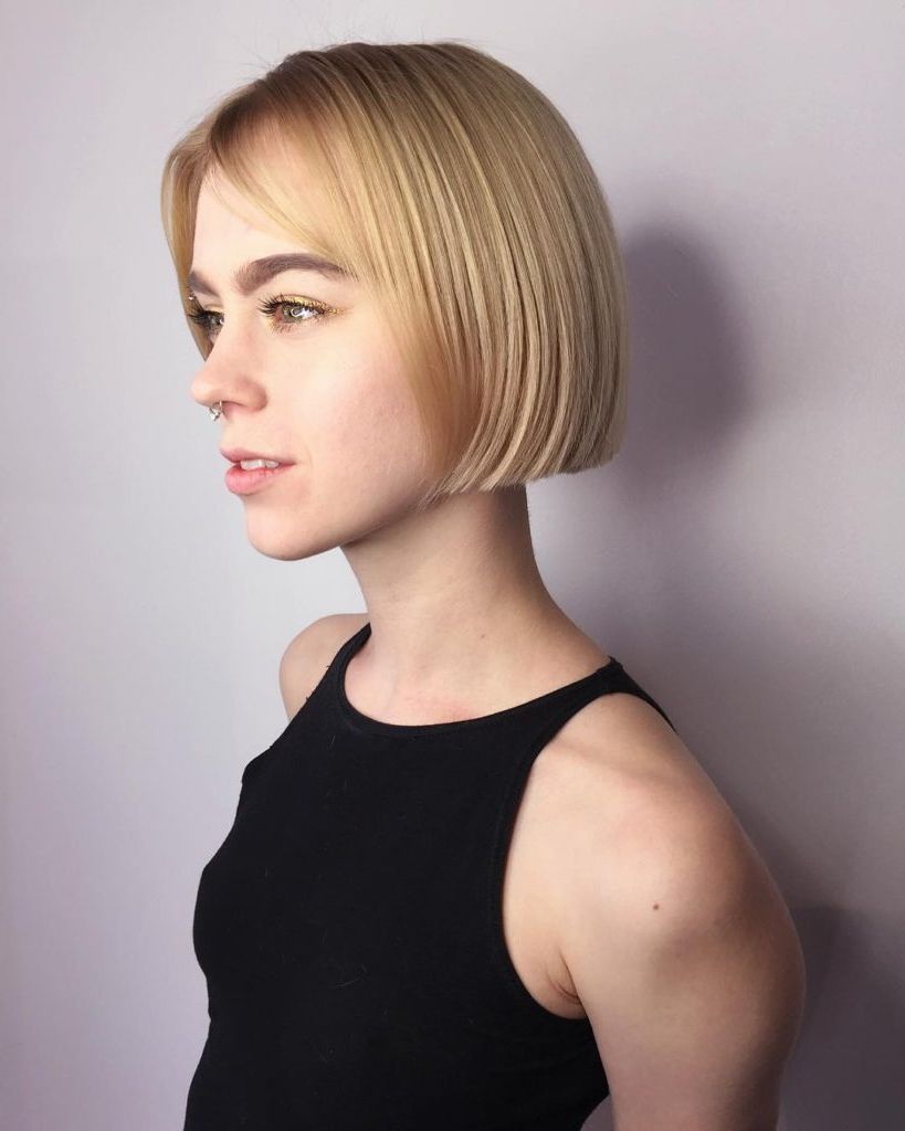 Women's Short Blonde Blunt Bob With Parted Bangs Short Hairstyle Intended For Short Hairstyles With Blunt Bangs (View 14 of 25)