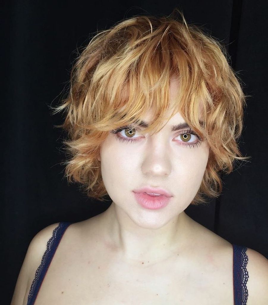 Women's Strawberry Blonde Shag With Undone Textured Waves And Bangs For Strawberry Blonde Short Hairstyles (Photo 6 of 25)