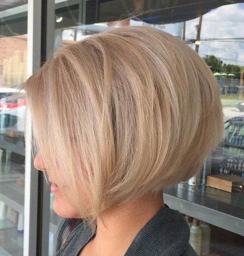 40 Short Bob Hairstyles: Layered, Stacked, Wavy And Angled Bob Cuts Throughout Classy Slanted Blonde Bob Hairstyles (View 1 of 25)