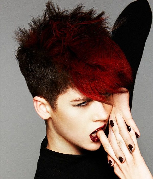 Short, Boyish Hairstyle With Black, Trimmed Sides And Long Red Bangs Pertaining To Black Choppy Pixie Hairstyles With Red Bangs (View 4 of 25)