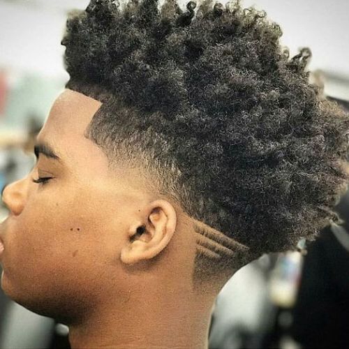 50 Eccentric Mohawk Haircut Ideas | Menhairstylist Men Hairstylist Pertaining To Curl–accentuating Mohawk Hairstyles (View 6 of 25)