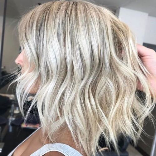 50 Inspiring Blonde Hairstyles | Hair Motive Hair Motive Intended For Most Recent Two Tier Caramel Blonde Lob Hairstyles (Photo 24 of 25)