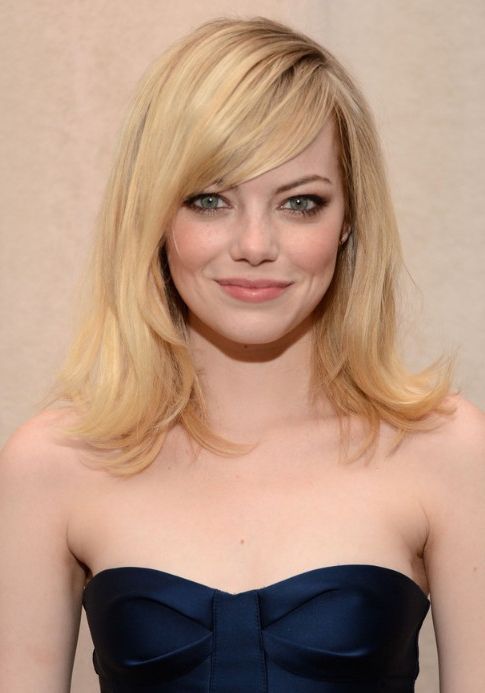 Emma Stone Layered Medium Length Hairstyle With Side Swept Bangs With Regard To Recent Shoulder Length Hairstyles With Long Swoopy Layers (Photo 8 of 25)