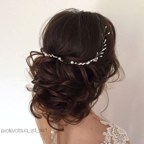 35 Chic Wedding Hair Updos For Elegant Brides – My Stylish Zoo Pertaining To Curly Wedding Updos With Flower Barrette Ties (View 4 of 25)
