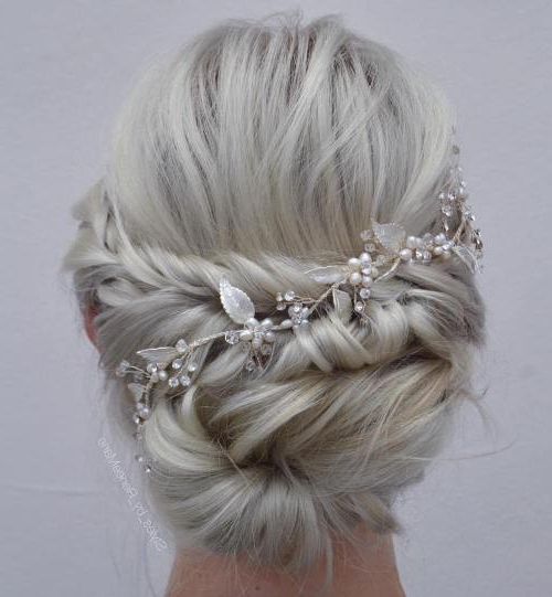35 Chic Wedding Hair Updos For Elegant Brides – My Stylish Zoo Within Undone Low Bun Bridal Hairstyles With Floral Headband (View 21 of 25)