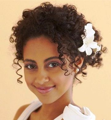 Bride's Curly Updo Bridal Hair Ideas Toni Kami Wedding Hairstyles With Regard To Curly Wedding Hairstyles With An Orchid (View 1 of 25)