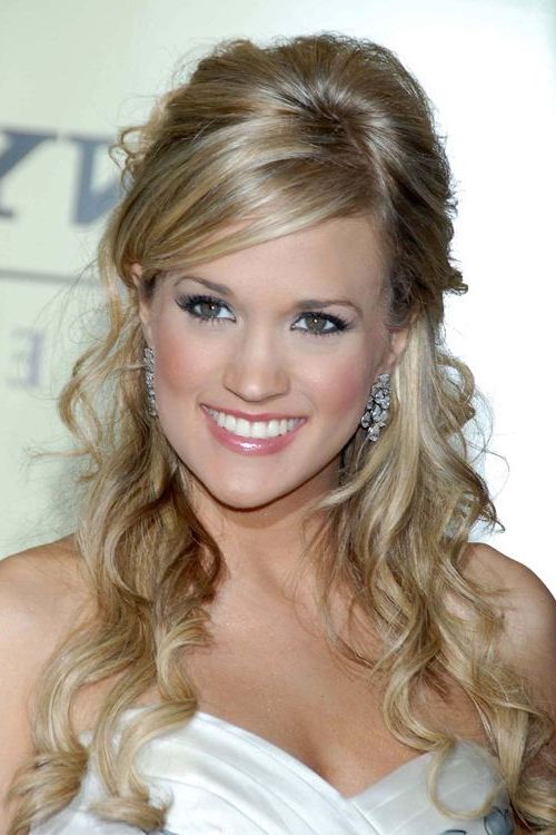 Carrie Underwood Wavy Ash Blonde Half Up Half Down, Sideswept Bangs Regarding Curly Ash Blonde Updo Hairstyles With Bouffant And Bangs (View 3 of 25)