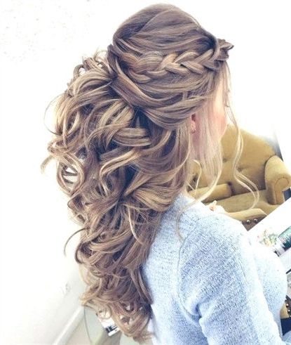 Curly Half Updo With A Braid And Bouffant #hairstylesforcurlyhair Regarding Curly Wedding Updos With A Bouffant (View 1 of 25)
