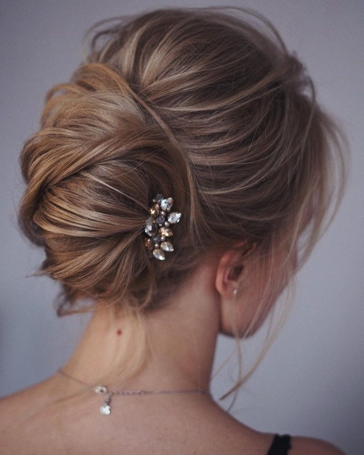 This French Twist Updo Hairstyle Perfect For Any Wedding Venue Throughout Voluminous Chignon Wedding Hairstyles With Twists (View 1 of 25)