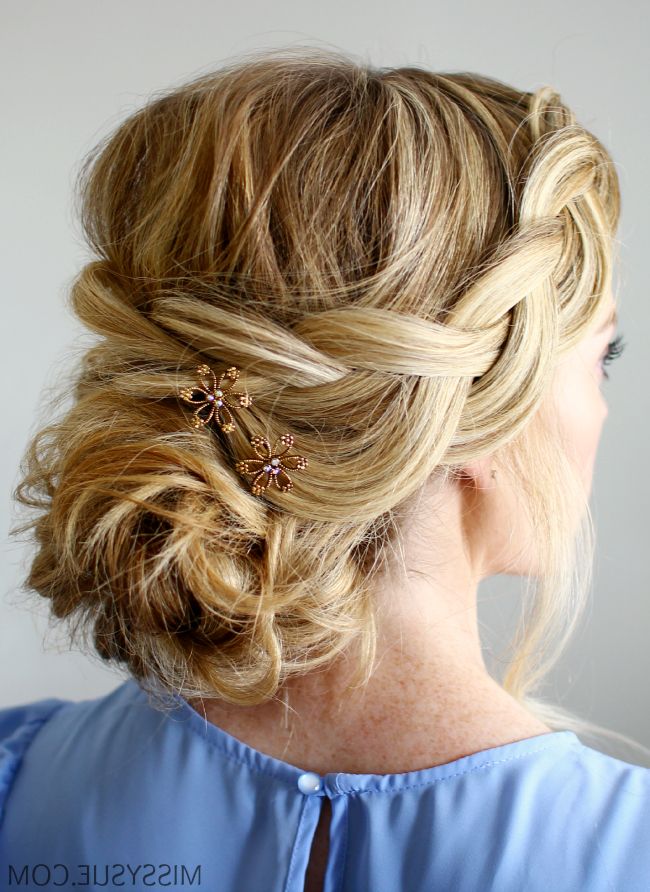 Wispy Braid And Low Bun Regarding Chignon Wedding Hairstyles With Pinned Up Embellishment (View 23 of 25)