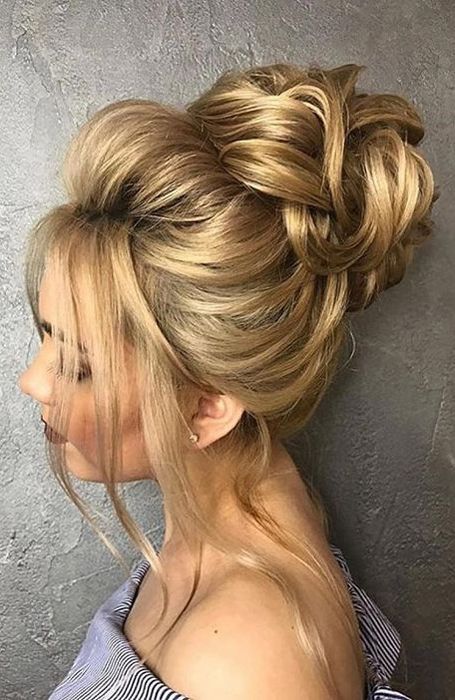 The Best Messy Bun Hairstyles For Every Hair Length – The Trend Spotter For Long Hairstyles Buns (View 19 of 25)
