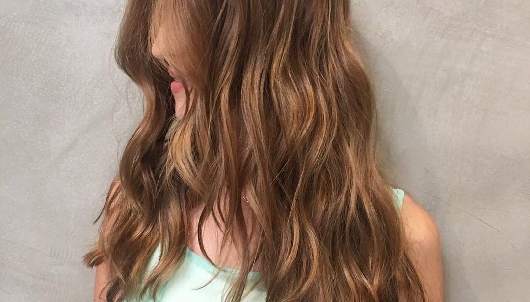 Women's Long Wavy V Cut Layers On Warm Light Brown Hair With Regard To Reddish Brown Hairstyles With Long V Cut Layers (View 18 of 25)