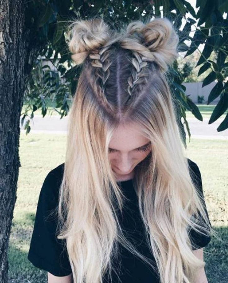 Trend Watch – Mohawk Braid Into Top Knot Half Up Hairstyles Within Newest Half Up Top Knot Braid Hairstyles (View 1 of 25)