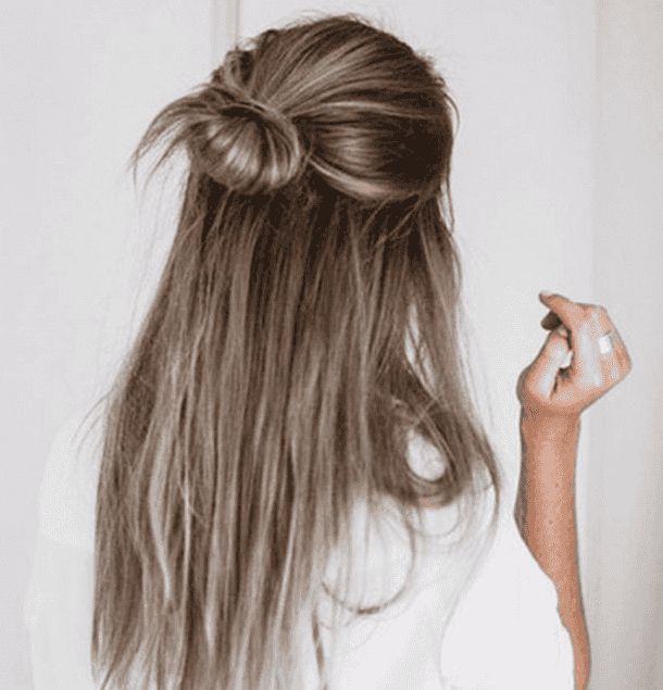 35 Best Half Up Bun Hairstyles That Don't Look Messy | Yourtango With Regard To Simple Half Bun Hairstyles (View 2 of 25)