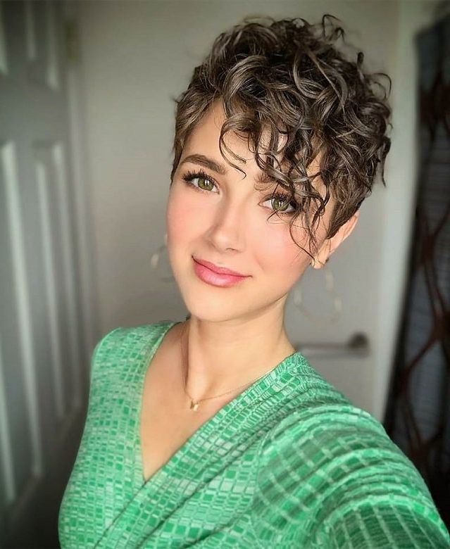 11 Of The Best Short Curly Hairstyles With Bangs [november Throughout Pastel Pixie Haircuts With Curly Bangs (View 4 of 25)