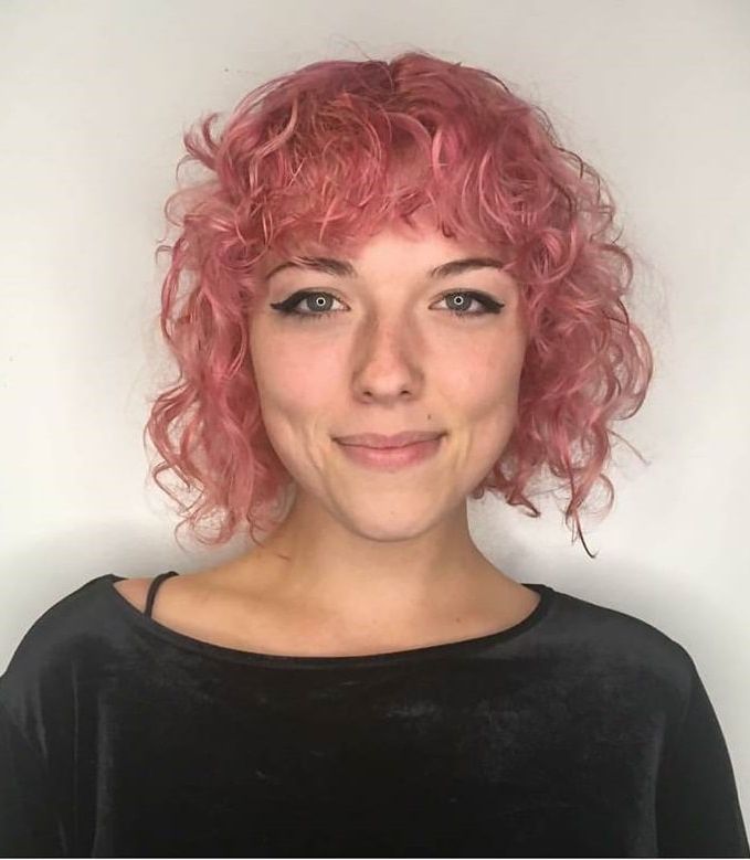 11 Of The Best Short Curly Hairstyles With Bangs [november With Regard To Pastel Pixie Haircuts With Curly Bangs (View 19 of 25)