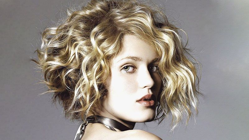 20 Best Inverted Bob Haircuts For Women – The Trend Spotter Intended For Short Asymmetric Bob Hairstyles With Textured Curls (Photo 18 of 25)