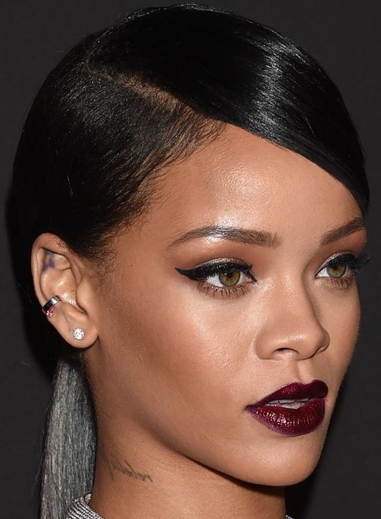 50 Best Rihanna Hairstyles Intended For Sleek High Bun Hairstyles With Side Sweep (Photo 12 of 25)