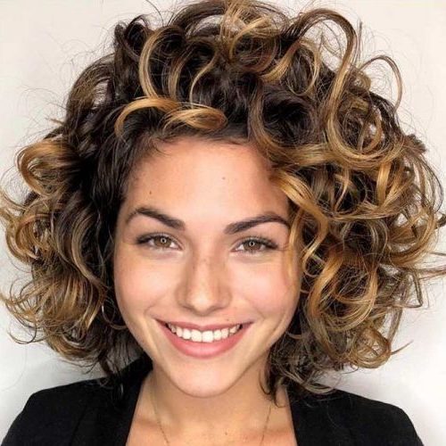 55 Beloved Short Curly Hairstyles For Women Of Any Age Regarding Curly Pixie Haircuts With Highlights (View 9 of 25)