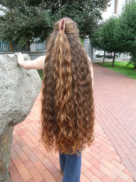 Simply Gorgeous. Her Wavy Hair Is Very Long And Thick. It's Throughout Cascading Silky Waves Hairstyles (Photo 23 of 25)