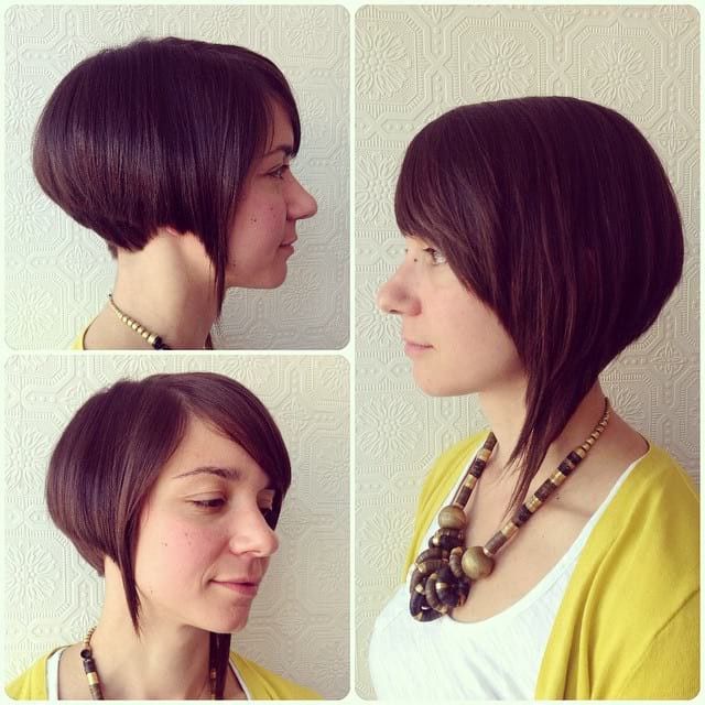 Sleek Asymmetric Angled Bob With Side Swept Bangs And Warm Within Asymmetrical Side Sweep Hairstyles (View 18 of 25)
