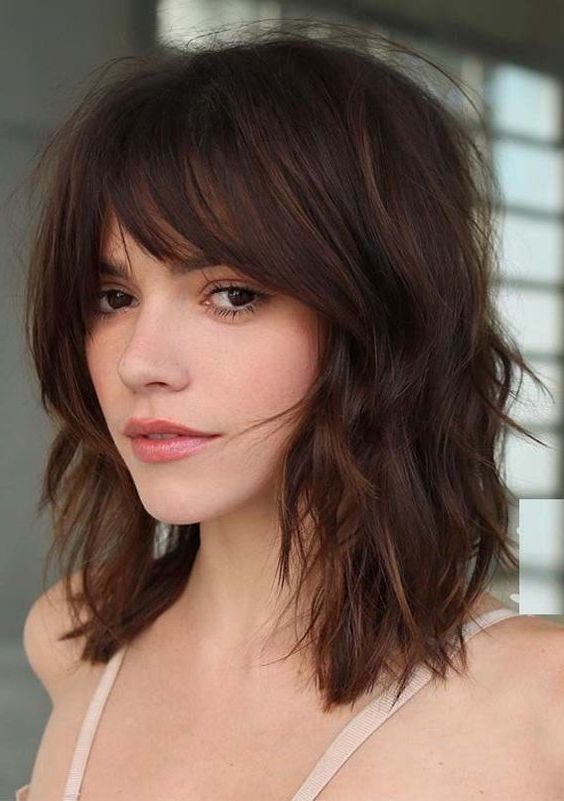 20 Different Types Of Bangs To Flatter And Frame Your Face With Regard To Edgy Face Framing Bangs Hairstyles (Photo 9 of 25)
