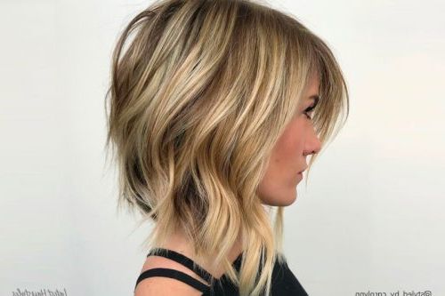 28 Most Flattering Bob Haircuts For Round Faces Within Sassy Angled Blonde Bob Hairstyles (View 22 of 25)