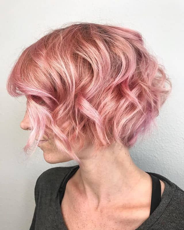 50 Bold Curly Pixie Cut Ideas To Transform Your Style In 2020 Intended For Most Popular Wavy Asymmetrical Pixie Haircuts With Pastel Red (Photo 10 of 26)