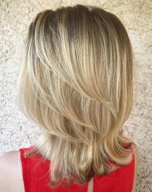 50 Mesmerizing Medium Length Layered Haircuts For 2020 Pertaining To Most Up To Date Long Feather Cut Bangs Hairstyles With Flipped Ends (View 9 of 25)