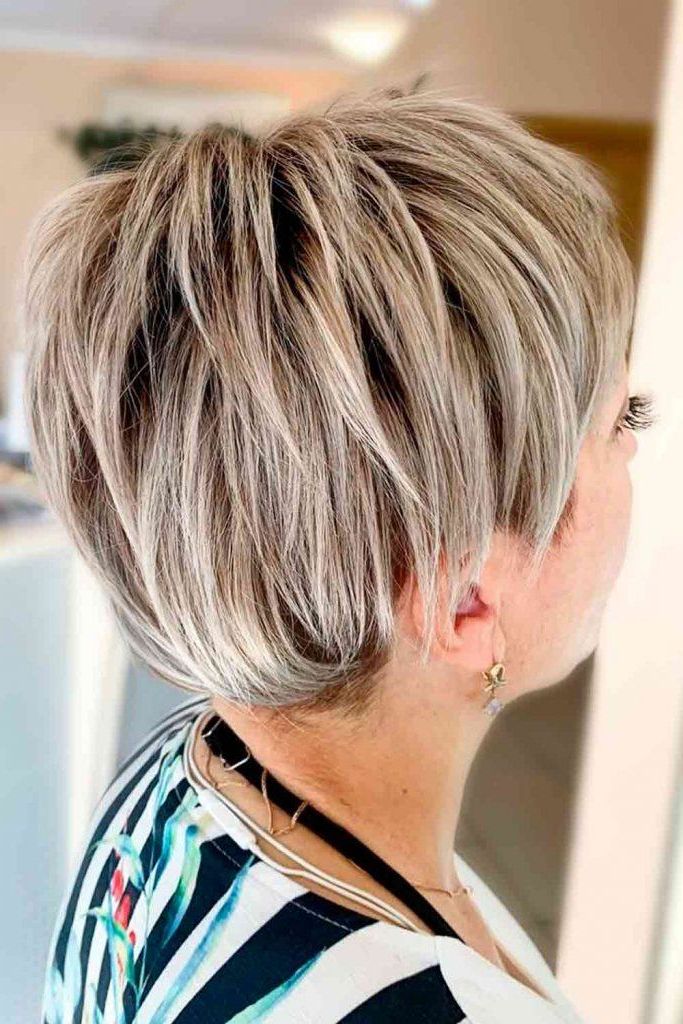 Short Haircuts For Women Over 50 That Take Years Off Intended For Most Up To Date Elegant Feathered Undercut Pixie Hairstyles (View 21 of 25)