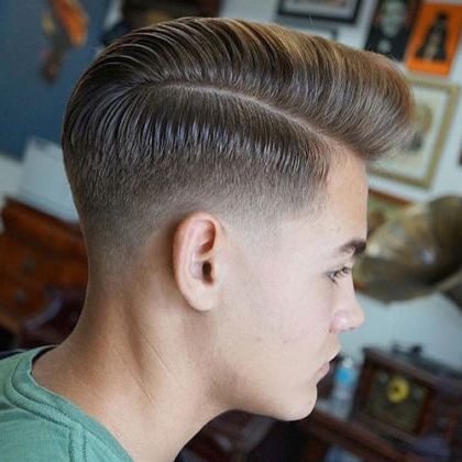 25 Stylish Haircuts For Men (2021 Guide) Within Best And Newest Contrasting Undercuts With Textured Coif (View 24 of 25)