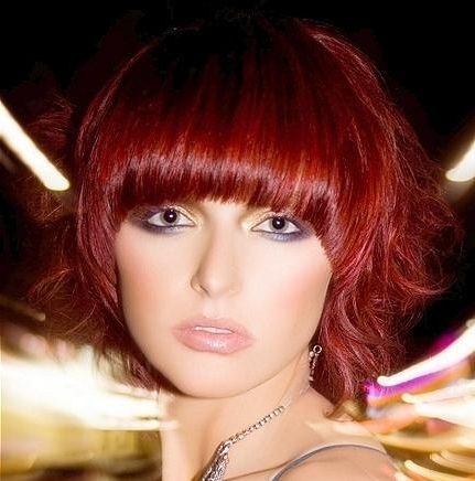 Bright Red Short Straight Hairstyle With Edgy Blunt Bangs Intended For Most Current Edgy Undercut Pixie Hairstyles With Side Fringe (View 14 of 25)