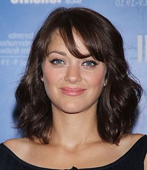 11 Cute Midlength Haircut Ideas | Glamour Intended For Wavy Textured Haircuts With Long See Through Bangs (Photo 6 of 25)