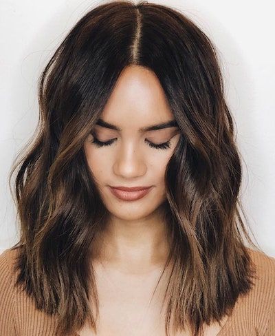 17 Best Summer Haircuts For 2020 | Glamour Within Lob Haircuts With Wavy Curtain Fringe Style (View 19 of 25)