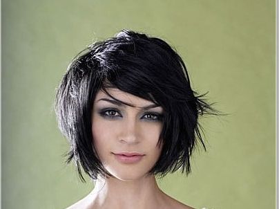Brunette Thick Hair Cut In Flirty Sexy Bob Hairstyle With In Long Wavy Pixie Hairstyles With A Deep Side Part (View 14 of 25)