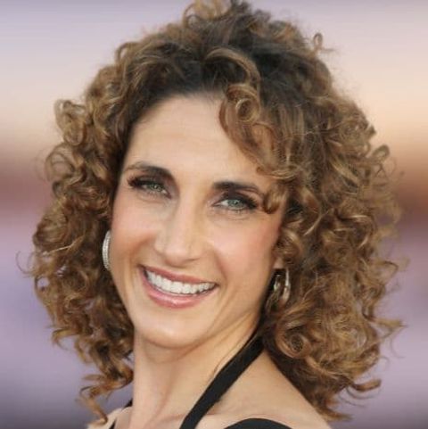 Curly Hairstyles For Older Women Are The Way To Look With Wavy Textured Haircuts With Long See Through Bangs (Photo 4 of 25)