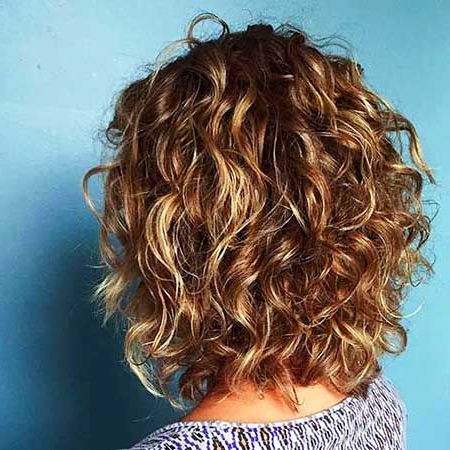 Popular Layered Haircut Solutions For Curly Hair With Long Hairstyles And Naturally Wavy Bangs (Photo 18 of 25)