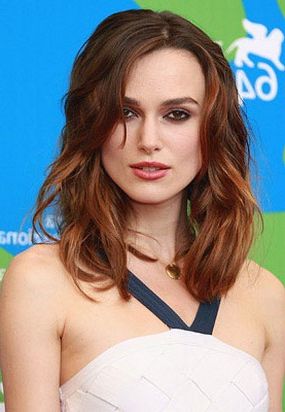 Keira Knightley With Wavy Hairstyle With Long Side Bangs With Regard To Most Recent Wavy Side Bang Hairstyles (View 12 of 25)