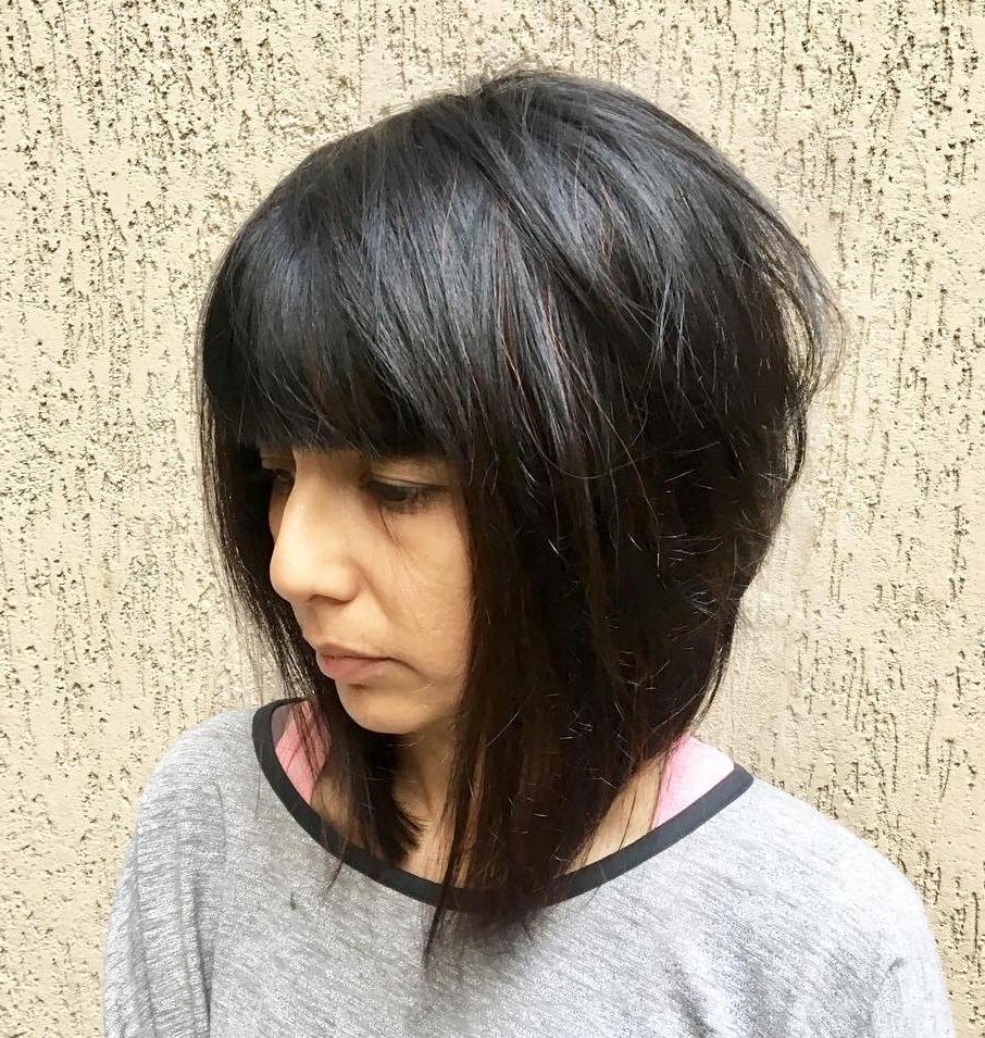 25 Latest Medium Length Hairstyles With Bangs For 2022 Regarding Newest Medium Haircuts With A Fringe (View 17 of 25)